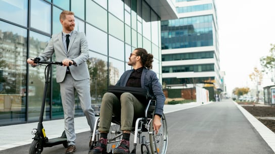 Two businessmen outdoors.