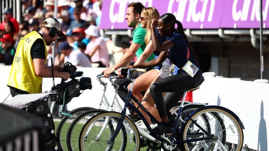 Multiple people on bikes.