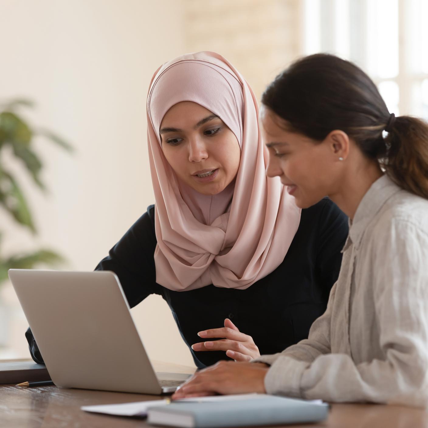 Women looking at laptop 