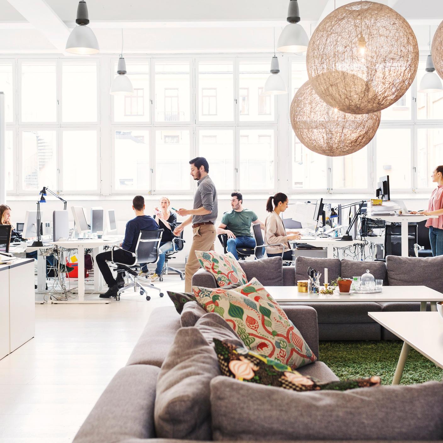 Office lobby with professionals working 