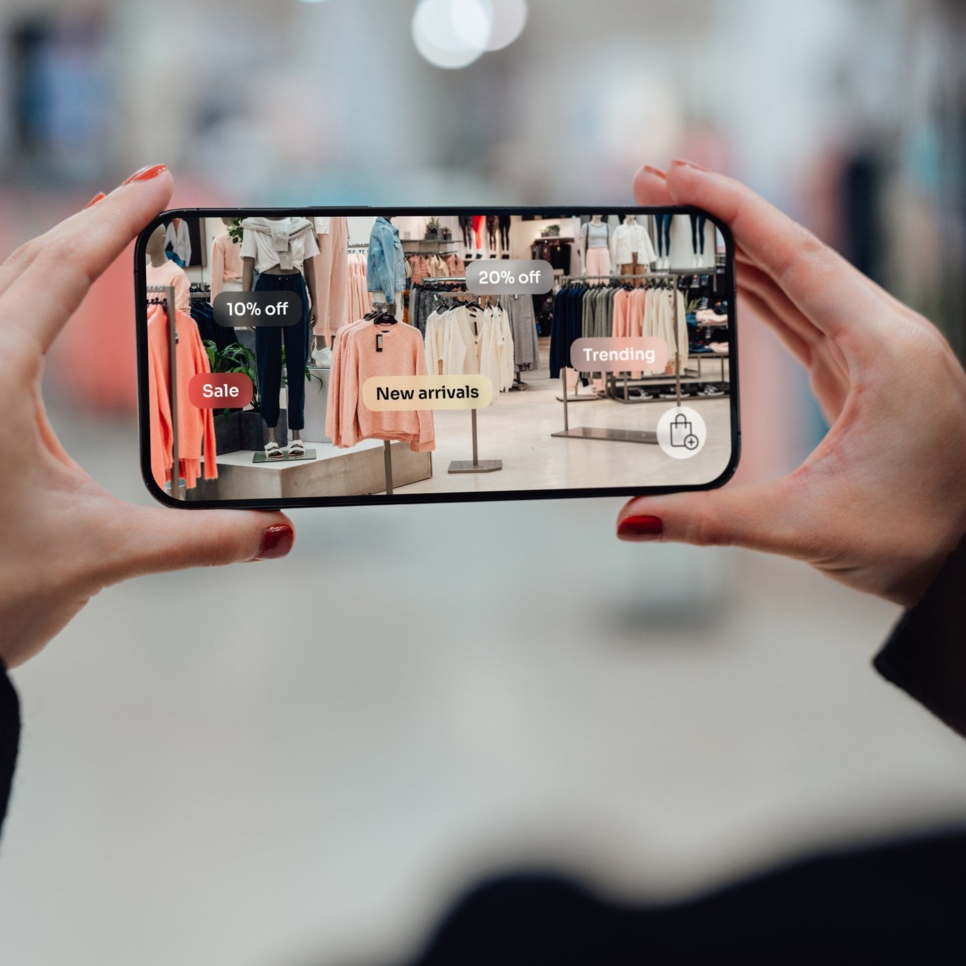 Female hand holding smartphone using augmented reality application